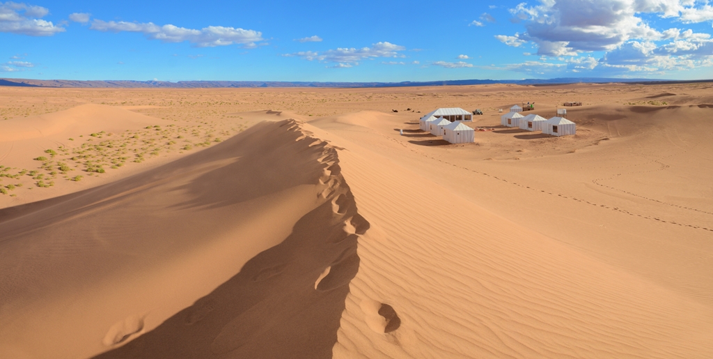 The dunes of Erg Lihoudi, in the south of Morocco, at Arawan Luxury Desert Camp